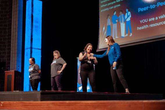 presenters on a stage