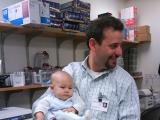 Ezra holding infant Maya