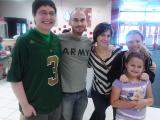 Noah (with Janie and unnamed man) shopping with Janie's  girls