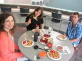 4 team members having waffles for breakfast