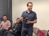 HHMI Celebration - Dr. Mendell with champagne