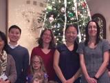 Lab members in front of Christmas Tree