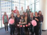 Lab team at Olga's Baby Shower holding letter "J" and banner "Julia"