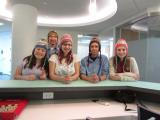 Lab team wearing gifted hats from Peru