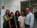 Four team members with Sarah
