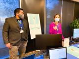 Two lab members at CDRC Spring event in Fort Worth showcasing VitalSign6 and Evexia.