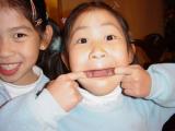 Two children making silly faces