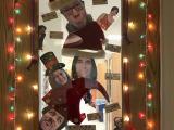 Door decorated with lights and silly photos of lab members