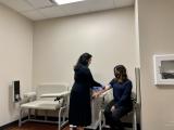 two women in a clinic room
