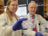 Dr. DeNisco and Dr. Zimmern in the lab
