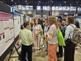 Danhui Liu presents her poster at AAI 2024